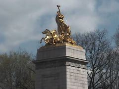 statue at entrance to central park