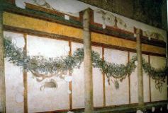 White triclinium with garlands 