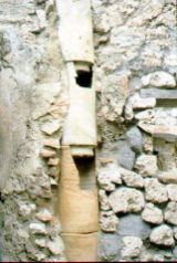 Clay heating ducts (hypocausts) embedded in the wall of a house, Pompeii 