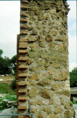 Another brick-concrete-rubble wall