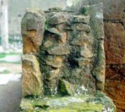  Cross-section of a brick faced concrete and rubble wall