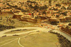 Model of the archaic Rome. Tiber, Isola Tiberina and Capitolium. Slopes of Aventine hill on the right.