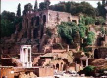 View of the Palatine complex from the Forum, with the columns of the  Temple of Vesta in the left foreground; Roman forum, Remnants of the temple of Mars; 50 BC-100AD